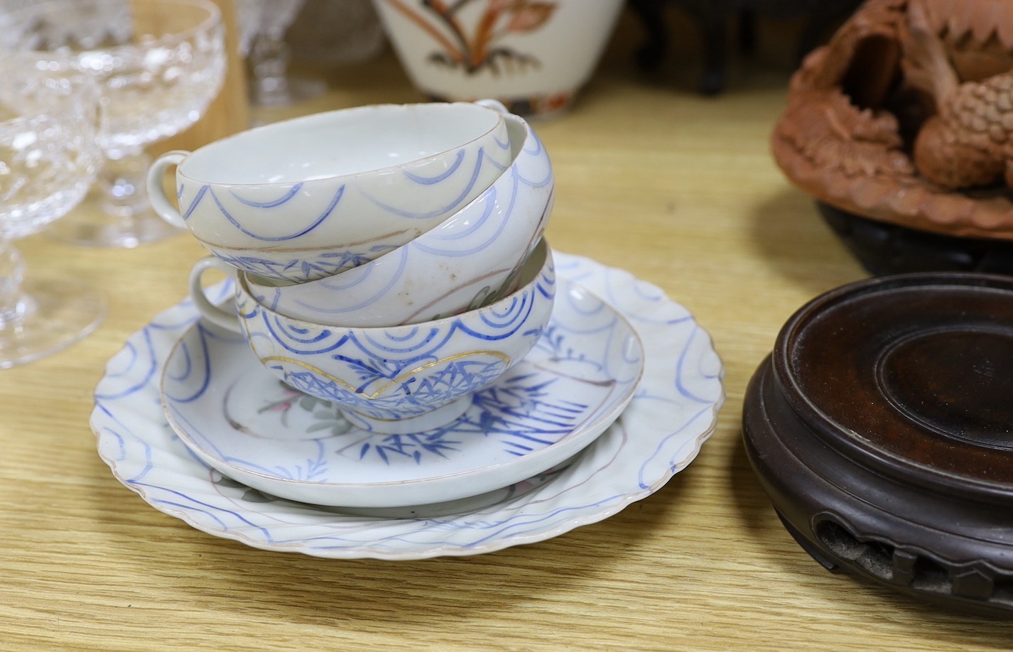 A late 19th century Chinese famille rose lamp (cut down) and other Chinese and Japanese ceramics and miscellaneous items